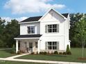 Beautiful rendering of a two-story home with a landscaped yard and inviting front porch at 257 Marvel Dr # 135, Rolesville, NC 27571