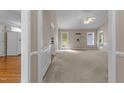 View of the living room and kitchen, showing the layout, finishes, and flow of the house at 304 Foxcroft Dr, Timberlake, NC 27583