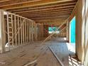 Interior view showing the wood framing of the new home under construction at 8920 Thompson Mill Rd, Wake Forest, NC 27587