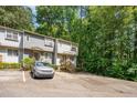 Desirable townhome boasts neutral siding, private entrances, and convenient parking at 3622 Colchester St # 17, Durham, NC 27707