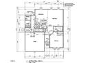 First floor plan showcases the kitchen, living room, dining room, garage, and covered porch at 3881 Josiah Ct, Nashville, NC 27856
