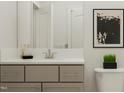 This bathroom has a sleek vanity with modern fixtures and an elegant design at 5537 Cayden Cove Dr, Wendell, NC 27591
