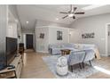 Open concept living area with vaulted ceilings, recessed lighting and modern furnishings at 6205 Houndsman Ct, Raleigh, NC 27616