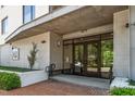 Inviting entrance with glass doors, brick pathway, and clean, modern design at 105 Chatham Walk Ln # 304, Cary, NC 27511