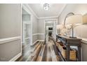 Spacious entryway features hardwood floors, neutral walls, and a console table with lamps at 178 Greenwich Dr, Sanford, NC 27330