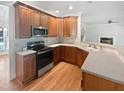 Well-equipped kitchen with stainless steel appliances and plenty of counter space at 2408 Tiltonshire Ln, Apex, NC 27539