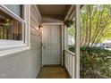 Close-up of the front door and porch area, highlighting the home's entryway and exterior details at 303 Applecross Dr, Cary, NC 27511