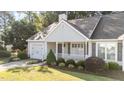 Well-maintained single-story home featuring an attached garage and a beautifully landscaped front yard at 3782 Loblolly Dr # 5, Rocky Mount, NC 27804