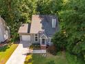 Charming one-story home featuring a well-maintained lawn and a welcoming front entrance at 4117 Olde Coach Rd, Durham, NC 27707