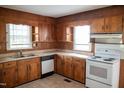Traditional kitchen featuring wood cabinets, laminate countertops, and modern appliances at 5004 Us 70 Alt, Princeton, NC 27569