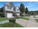 Charming townhomes with manicured lawns, private driveways, and attractive landscaping at 3636 Water Mist Ln, Raleigh, NC 27604