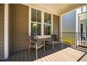 Relaxing front porch with comfortable chairs, offering a great space to unwind and enjoy the fresh air at 1168 Great Ridge Pkwy, Chapel Hill, NC 27516