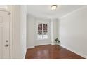 Cozy living room features hardwood floors and a large window at 2323 Pindos Dr, Cary, NC 27519