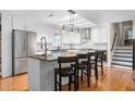 Kitchen featuring stainless steel appliances, a center island with seating, and a skylight at 2816 Keck Dr, Burlington, NC 27215