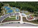 Overhead view of the community park featuring tennis courts, garden, and playground areas at 3825 Cary Glen Blvd, Cary, NC 27519