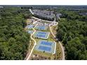 Aerial view of community tennis courts, playground, and green space with walking trails at 3825 Cary Glen Blvd, Cary, NC 27519