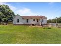 Spacious backyard with a well-maintained lawn and peaceful setting at 4240 Friendship Rock Creek Rd, Burlington, NC 27215