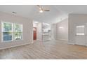 Open living space with a view of the kitchen, dining area and front door at 108 Ellsworth Pl, Cary, NC 27511