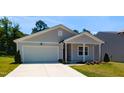 Charming single Gathering home with a two car garage and well manicured front lawn at 1444 Heron Pond St, Raleigh, NC 27604