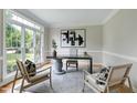 Bright office with large window, elegant desk, and neutral tones at 500 Walcott Way, Cary, NC 27519