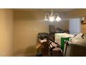 Room with overhead lighting and a window at 929 Morreene Rd # C-14, Durham, NC 27705