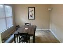 Inviting dining room with modern table and chairs, perfect for entertaining at 929 Morreene Rd # D-34, Durham, NC 27705