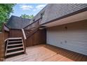 Spacious back deck with stairs leading up to a second level, perfect for outdoor entertaining and relaxing at 346 Summerwalk Cir, Chapel Hill, NC 27517