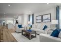 Bright living room with modern furnishings and an open floor plan at 456 Grand Silo Rd, Garner, NC 27603