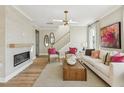 Bright living room with fireplace and decorative accents creating a cozy atmosphere at 610 Callan View Ave, Wake Forest, NC 27587