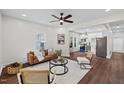 Bright living room with modern decor, hardwood floors, and ample natural light at 813 N Main St, Burlington, NC 27217