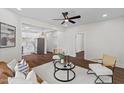 Stylishly decorated living room with comfortable seating and an open floor plan at 813 N Main St, Burlington, NC 27217