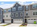 Attractive townhome showcases clean lines and an inviting facade at 1114 Crossvine Trl, Durham, NC 27703