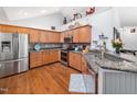 Spacious kitchen with stainless steel appliances, granite countertops, and ample cabinet space at 1167 Blue Bird Ln, Wake Forest, NC 27587