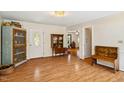 Inviting living room with wood floors, bright natural light, and charming built-in features at 3619 Nc-57, Hillsborough, NC 27278