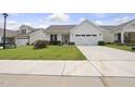 Beautiful single-Gathering home with green grass, lovely landscaping, and an attached garage at 537 Bramble Ln, Clayton, NC 27527