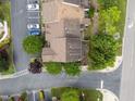 Aerial view of townhome complex with lush landscaping and ample parking at 5515 South Roxboro # 32, Durham, NC 27713