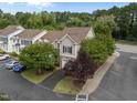 An aerial view showing the townhome's position in a green, landscaped community at 5515 South Roxboro # 32, Durham, NC 27713