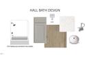 Hall bathroom design includes a standard fiberglass shower/tub combo, neutral cabinet, countertop, flooring and fixtures at 749 Parc Townes Dr # 33, Wendell, NC 27591