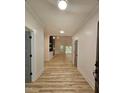 View of the foyer showing hardwood floors and an open floor plan at 1414 Sagamore Dr, Louisburg, NC 27549