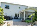 Spacious backyard featuring a screened-in porch, a hot tub, and plenty of seating at 365 Jorpaul Dr, Wake Forest, NC 27587