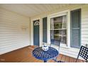 Cozy front porch featuring an inviting seating area, perfect for relaxing and enjoying the outdoors at 408 N Fourth/ 4Th St, Mebane, NC 27302