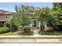 Charming home with a welcoming front porch, mature trees, and well-maintained lawn at 444 Claremont Dr, Chapel Hill, NC 27516