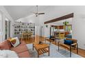 Open floor plan featuring living room, dining area, and modern kitchen at 908 Cedar Fork Trl, Chapel Hill, NC 27514