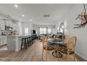 Open-concept living room seamlessly connects to the dining area and modern kitchen at 1891 Frost Dr, Haw River, NC 27258