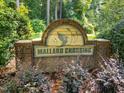 Mallard Crossing community sign featuring a duck and lush greenery at 2205 Bufflehead Rd, Raleigh, NC 27616