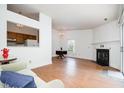 Bright living room showcasing hardwood floors, fireplace, and natural light at 2213 Alpine Rd, Durham, NC 27707