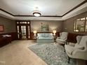 Cozy lobby featuring a comfortable sofa, armchairs, and elegant decor at 3701 Baron Cooper Pass # 303, Raleigh, NC 27612