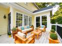 Relaxing outdoor patio space with comfortable seating, perfect for entertaining or enjoying the outdoors at 6201 King Croydon Ct Ct, Raleigh, NC 27603