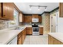 Functional kitchen with stainless steel appliances and ample counter space at 6422 English Oaks Dr, Raleigh, NC 27615