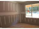 A corner of the room with natural light and construction elements at 25 Autumnwood Ln, Spring Hope, NC 27882